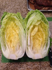 Cut a slit down the middle of your Napa cabbage and then gently pull apart to keep the leaves in their natural, frilly state.
