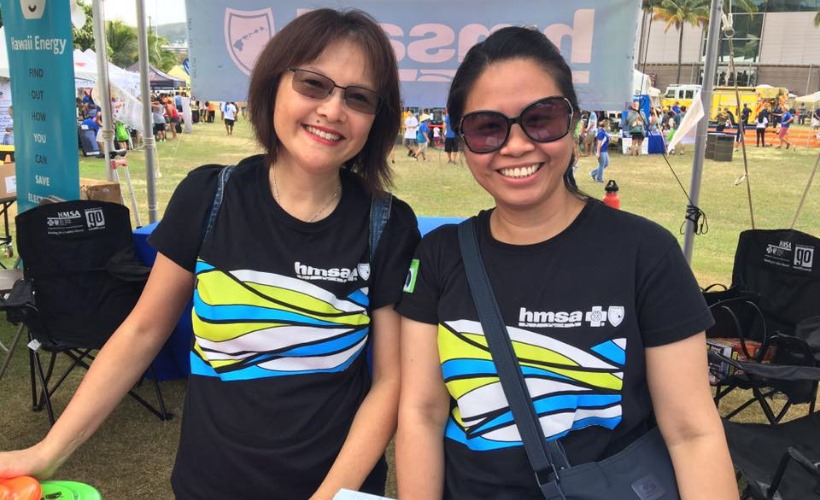 Team HMSA volunteers, Michelle Ko-Wong and Tess Saoit, greeted keiki that stopped by our booth. 